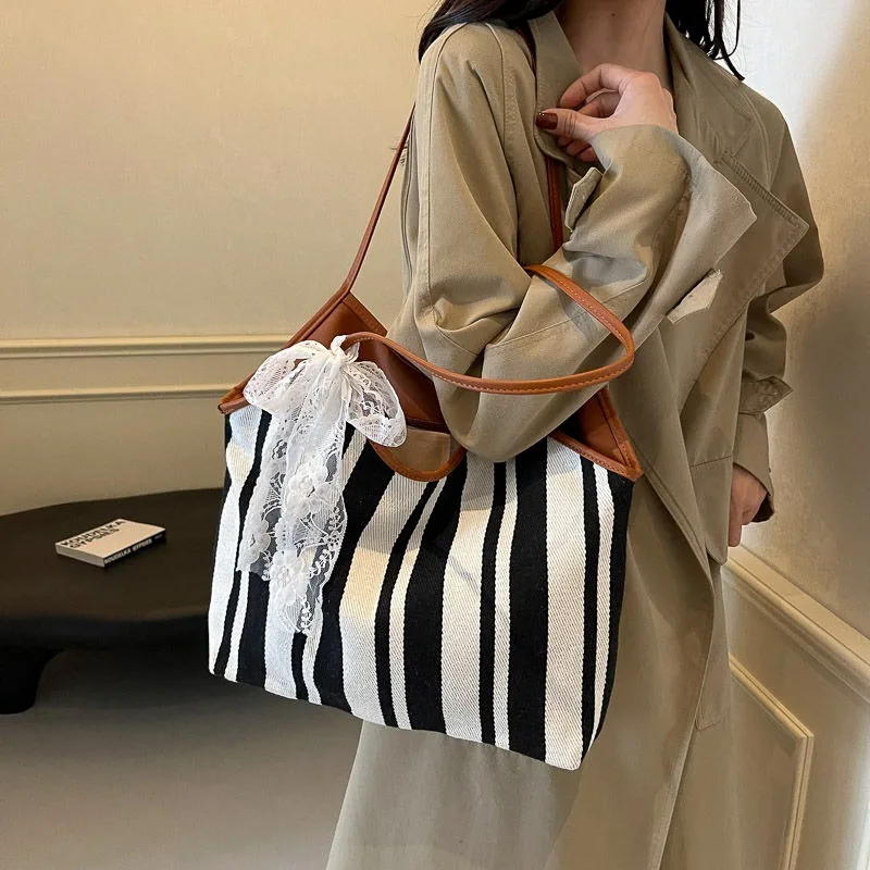 Casual Large-capacity Striped Bag New Vacation Lazy Commuter Shoulder Bag Female Tote Armpit High Quality  High Appearance Level