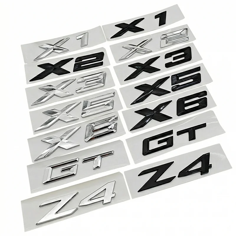 

NEW 3D ABS Glossy Black Logo X1 X2 X3 X5 X6 X7 GT Z4 Emblem Car Rear Trunk Badge Sticker For E84 F39 U10 E83 F25 E70 F15 F16 G07