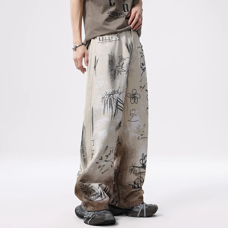 Celana jins pria, celana jins Denim longgar kasual Hip Hop, celana jins Streetwear mode, celana Graffiti jalanan Amerika