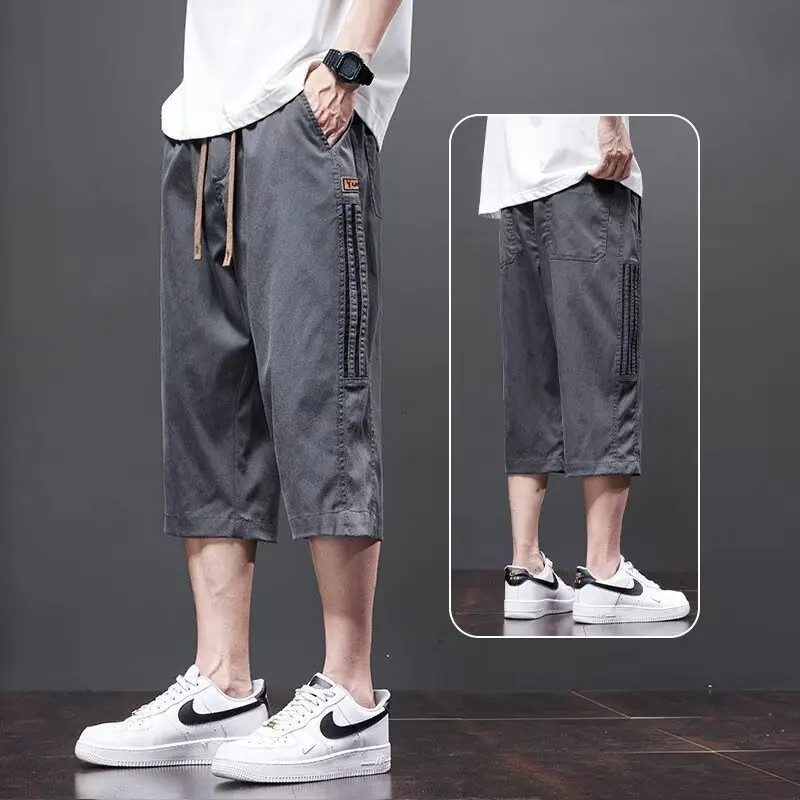 

Seven point pants men's 2026 summer loose oversized quick drying casual shorts thin breathable 7-point sports pants trend