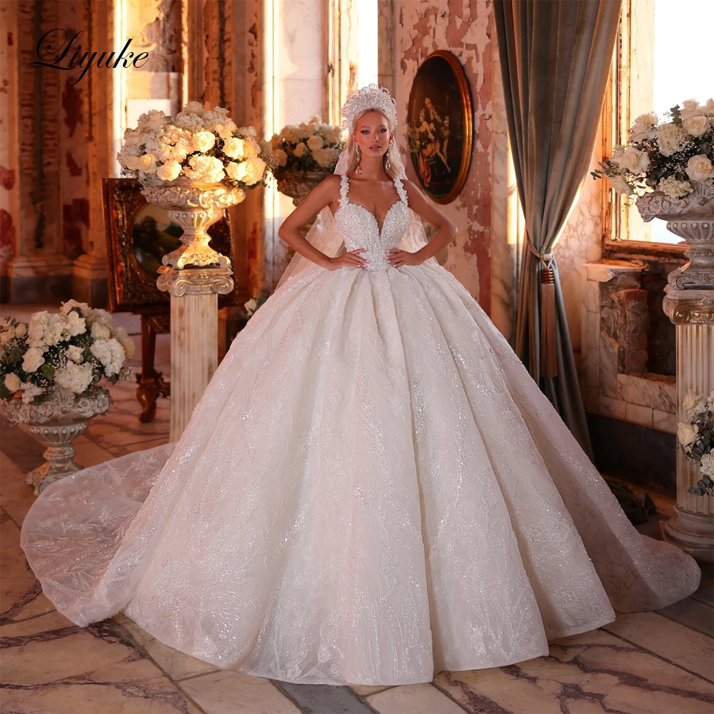 Liyuke Custom Made Luxury Lace Beading Pearls Embroidery Princess Ball Gown Wedding Dress Spaghetti Straps Puffy Bridal Gowns
