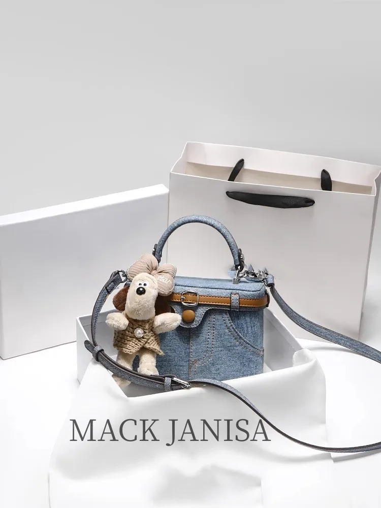 

2025 New Luxury Makeup Bag with Charming Decoration Denim Canvas and Pendant Women Stylish and Versatile Handheld Crossbody Bag