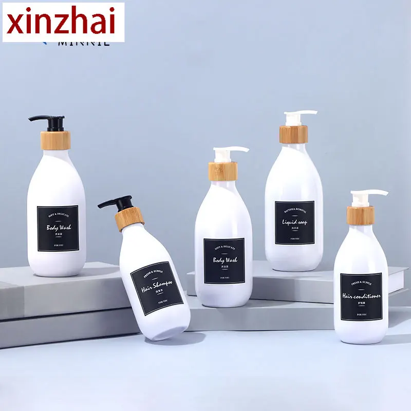 Black high-value 500ml hand sanitizer bottle light luxury bamboo and wood pump head pressing lotion bottle shampoo bottle