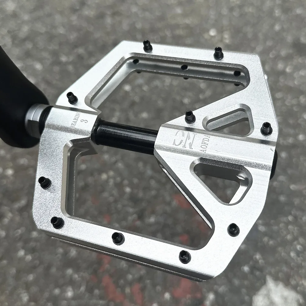 

Universal Mountain Bike Pedal Aluminum Alloy Wide Anti-slip Three Bearings Dirt Bike Bicycle Flat Foot Pedal Cycling Parts