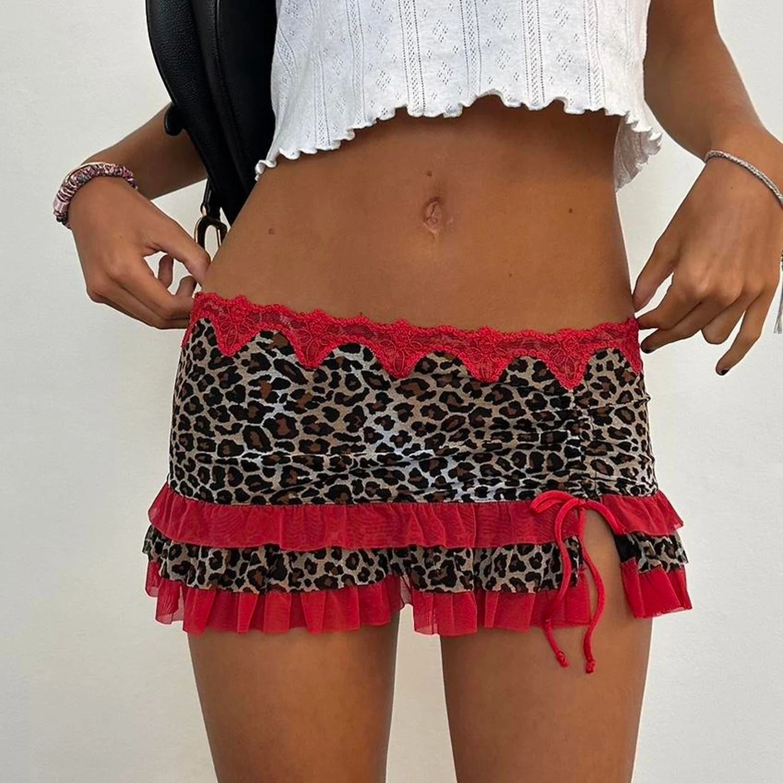 Mini falda corta para mujer Falda corta de moda con borde de encaje y volantes con estampado de leopardo de talle bajo