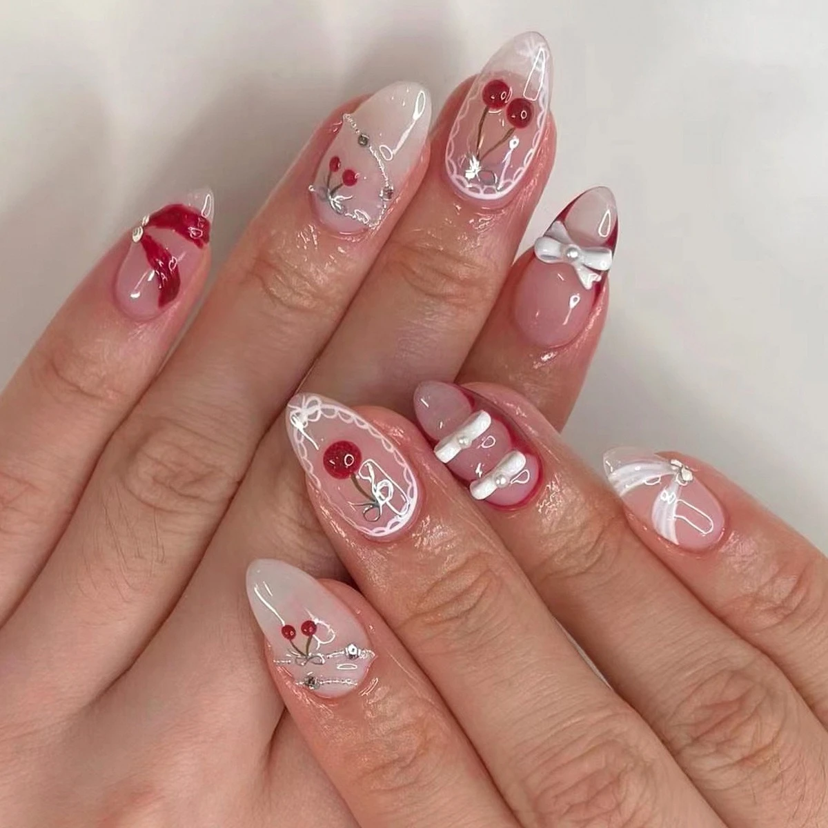 

24Pcs Almond Pink Fake Nails with Cherry Pattern French Nails Patch Pearls Bow Finished Acrylic Nail Wearable Manicure for Women