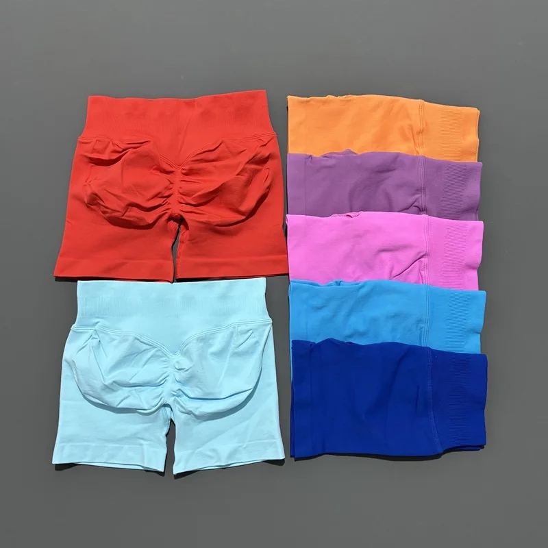 Histello السراويل الرياضية 4.5 "المرأة سلس اليوغا طماق منخفضة الخصر Scrunch بوم الجوارب تشغيل اللياقة البدنية قصيرة تجريب الصالة الرياضية السراويل