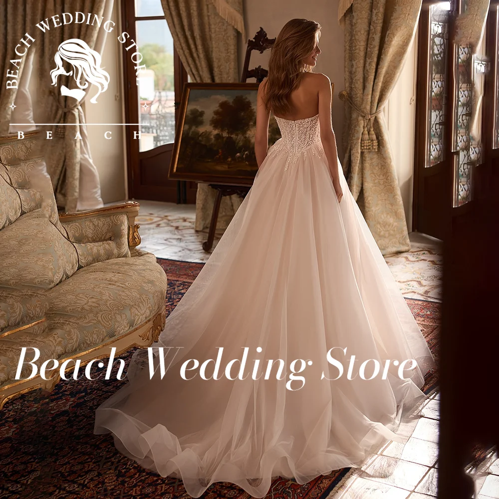 ビーチ恋人モダンノースリーブチュールストラップレスバックレスレースブライダルドレスハイスリット 2025 Vestidos デノビアカスタマイズ