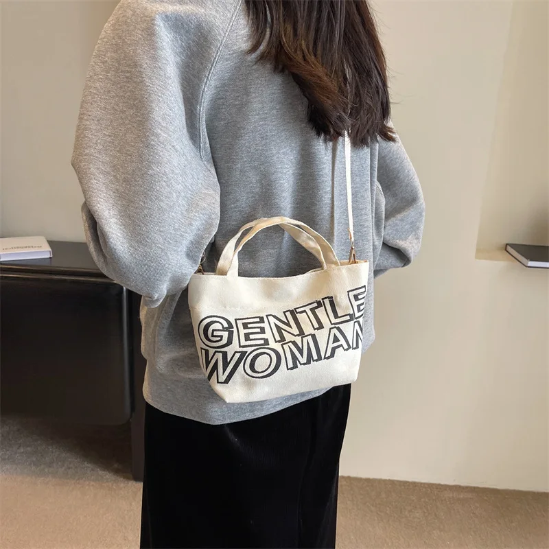 bolsa-tote-casual-de-lona-com-letras-versatil-design-simples-grande-capacidade-bolsa-de-ombro-macia-para-uso-diario-tendencia-2024-sle