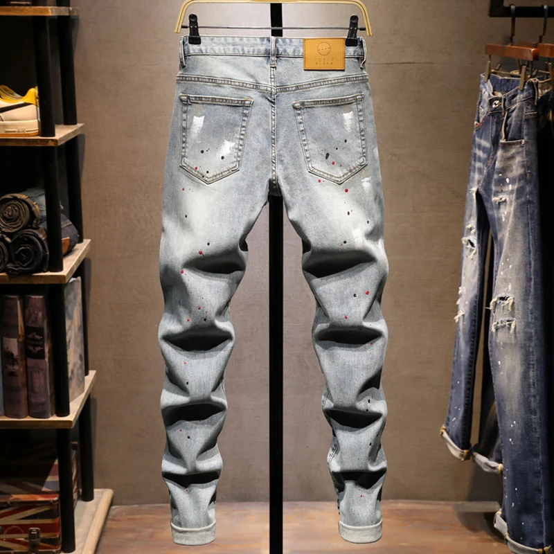 Pantalones vaqueros rasgados pintados ajustados elásticos azules lavados Retro a la moda de diseñador callejero para hombre Y2K Hip Hop Vintage pantalones vaqueros