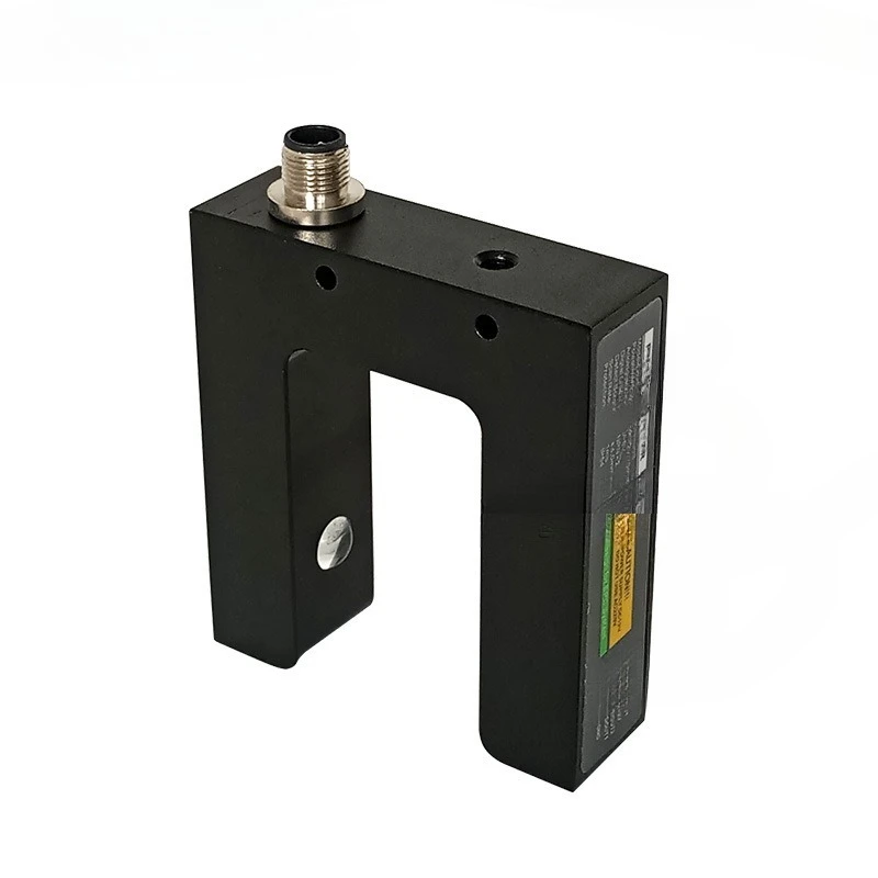 

Printing press, side-to-side tracking, correction control system, photoelectric sensor