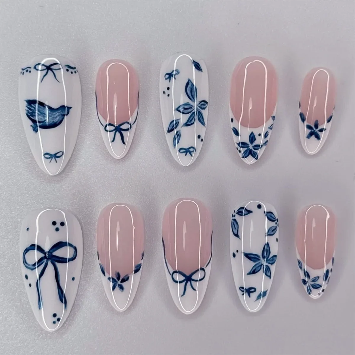 

24PCS French False Nail Fresh Blue bow flower Pattern Short Almond Press on Nails Full Cover Wearable Fake Nails Simple Design