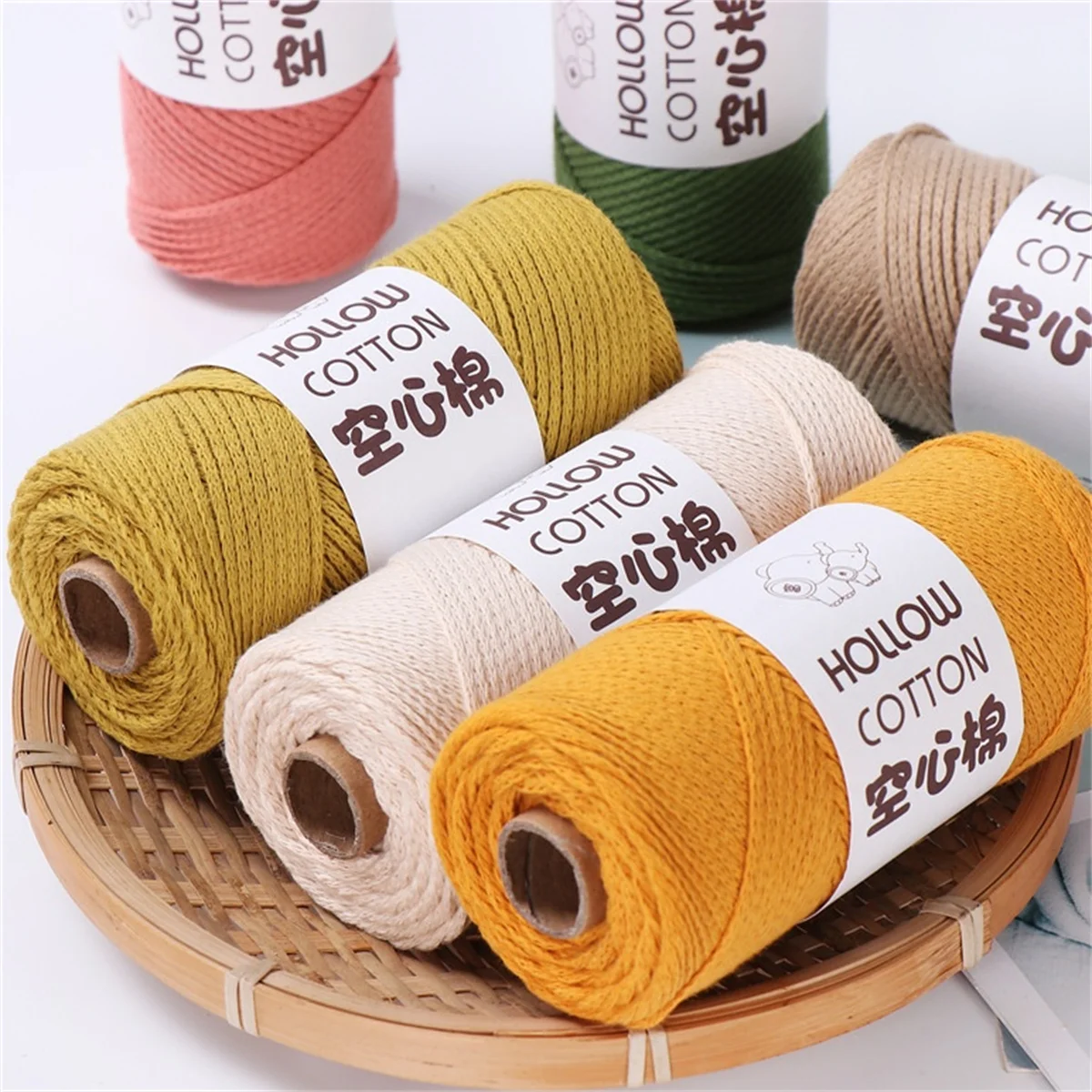 A Roll of 2mm Hollow Cotton Round Strand Yarn DIY Woven Round Rope is Used to Hook and Weave Hollow Cotton Thread for Bags