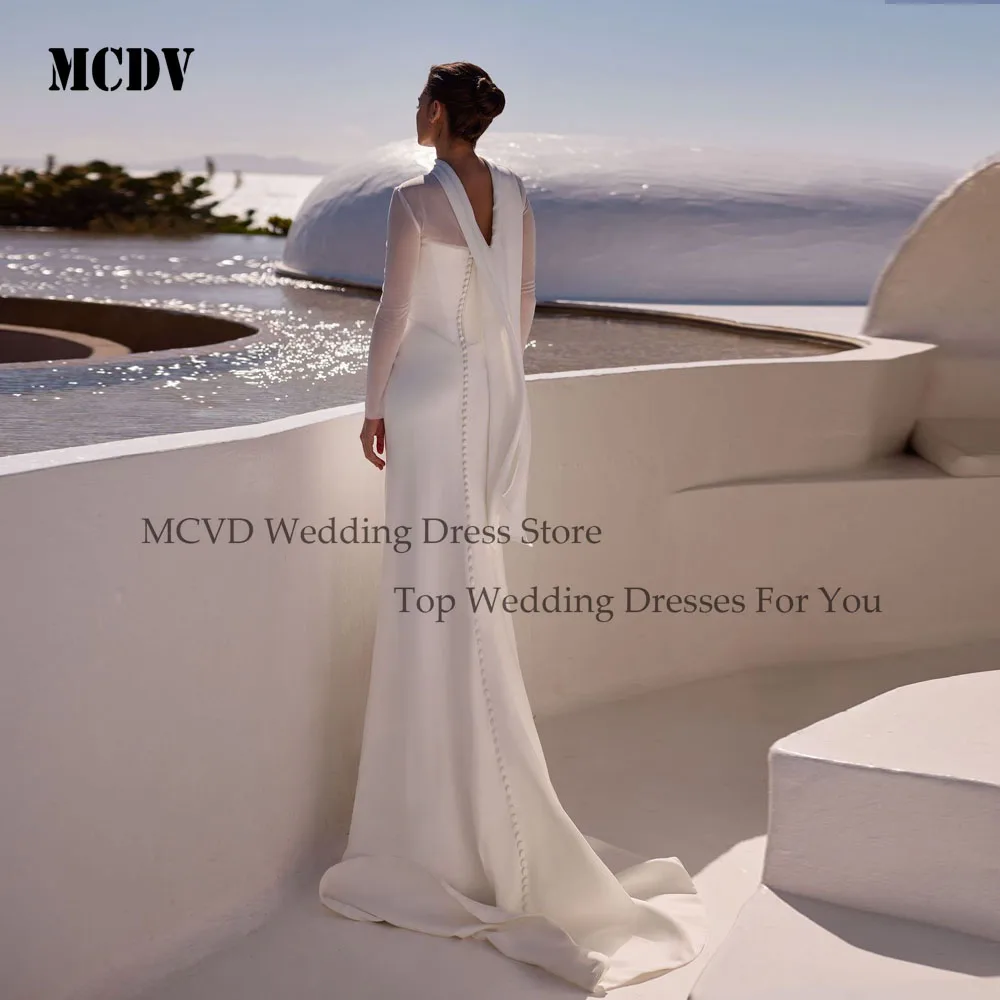 فساتين زفاف MCDV مخصصة بدون حمالات بطيات 2025 حورية البحر بأزرار خلفية بدون أكمام من الساتان فستان العروس عاجي فيستدوس دي نوفيا
