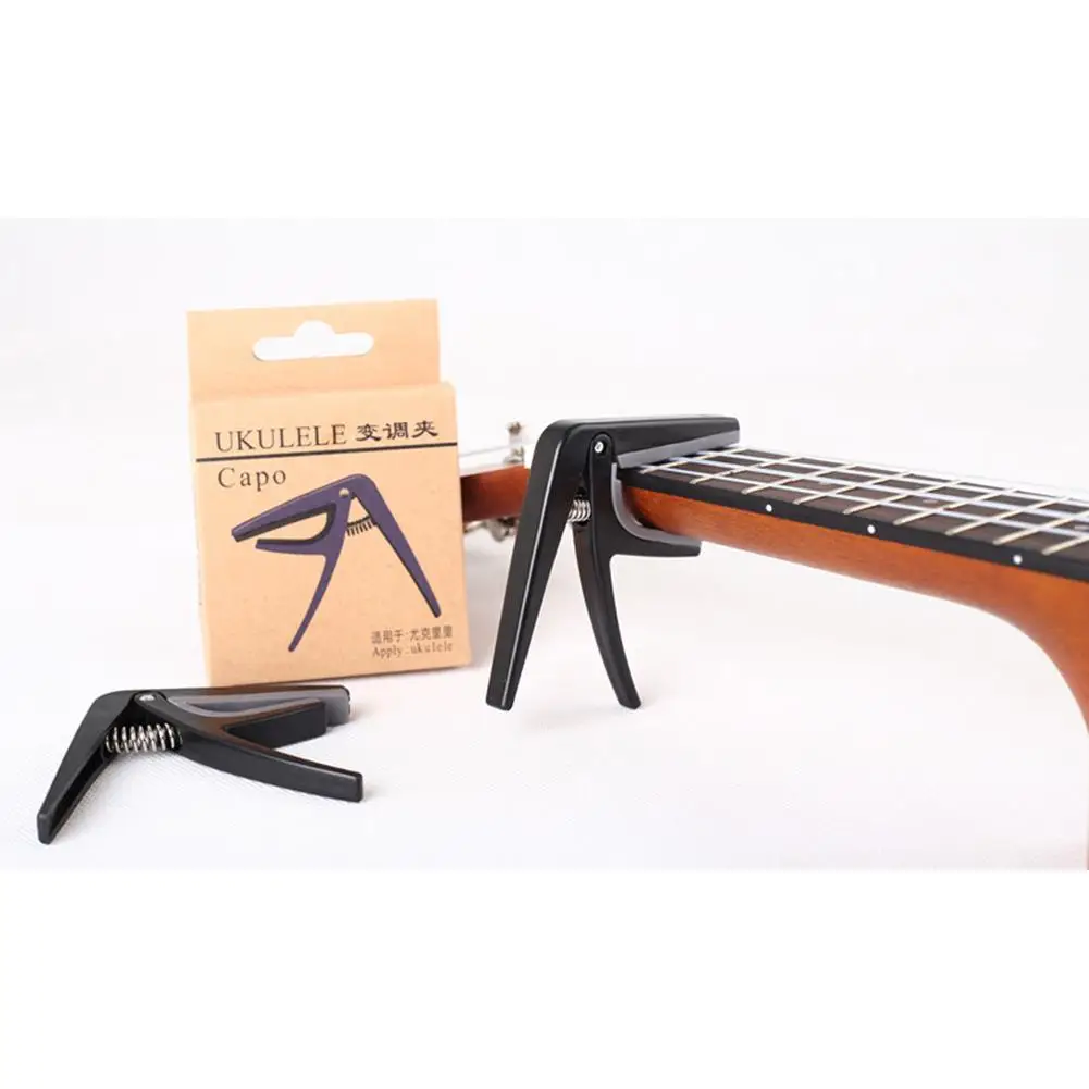 Professional Ukulele Capo Single-handed Quick Change Ukelele Capo 4 Strings Hawaii Guitar Capos Guitar Parts & Accessories