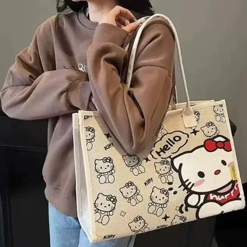 

Сумка-тоут Hello Kitty из холщовой ткани, на одно плечо, для девочек-студенток, большая вместимость, универсальная, с принтом, для женщин, с изображением аниме-персонажей