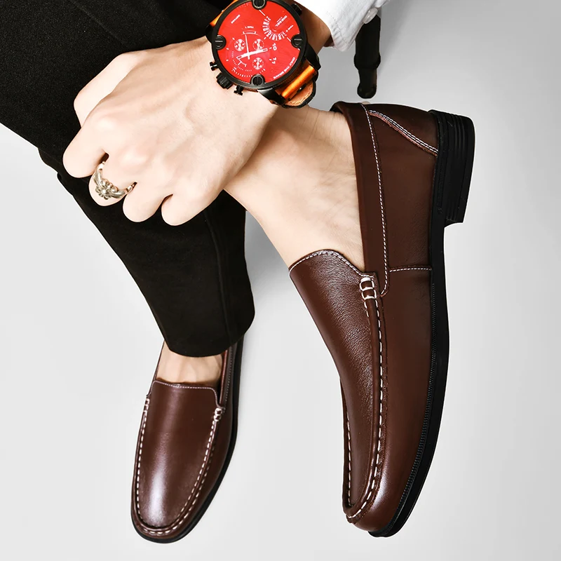 

Brand New Men Cowhide Comfortable Soft Soled Casual Leather Shoes Fashionable Summer Men Punched Breathable Casual Driving Shoes