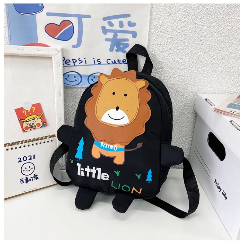 Mochila escolar de dibujos animados para niños, morral de hombro ligero con diseño de León para guardería, 2023