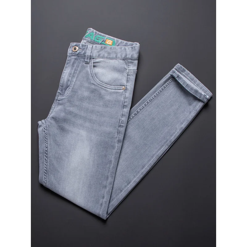 กางเกงยีนส์ผู้ชายอินเทรนด์ระดับไฮเอนด์ 2025 ฤดูร้อนกางเกงยีนส์ยืดบางแฟชั่นสลิมฟิตกางเกงสีเทาเท้าเล็ก