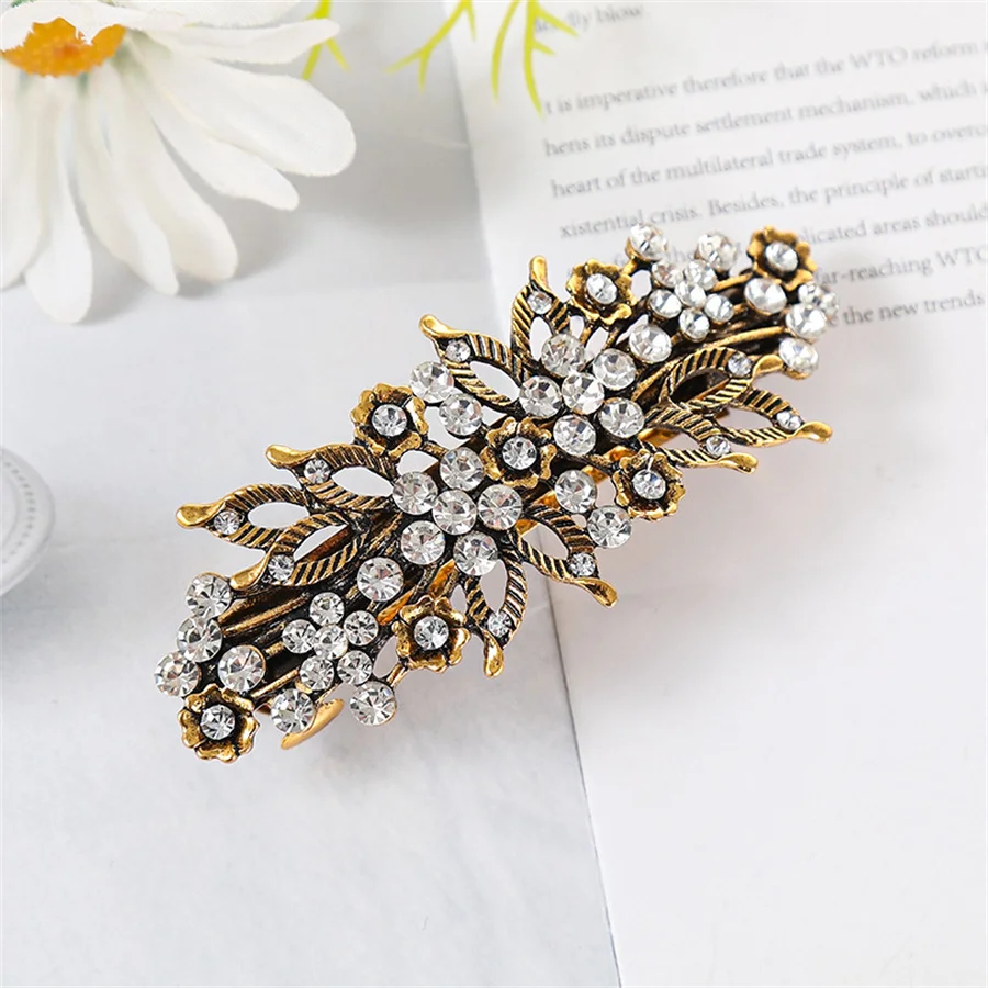 The new Korean version of the crystal flower spring hairpin elegant rhinestone wild ponytail hairpin women\'s hair accessories