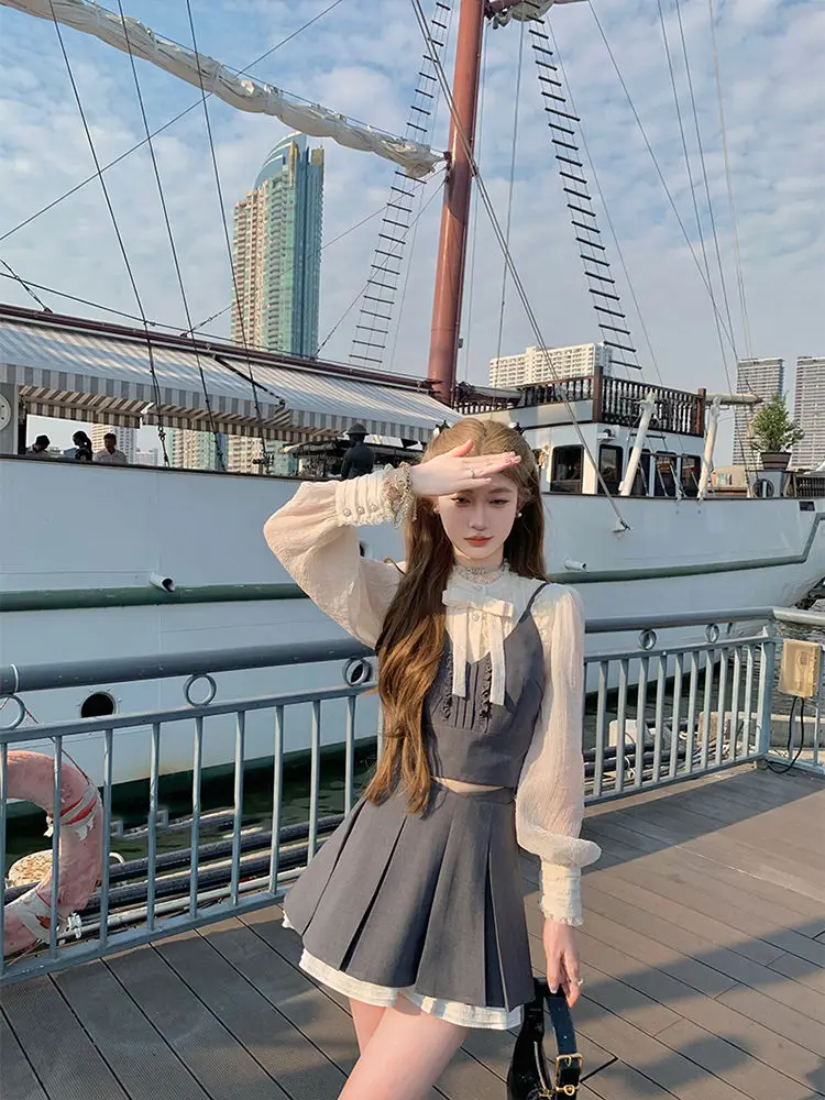 Korean Three Piece Set Bow Lantern Sleeve Shirt+Solid Color Suspender Vest+High Waist Slimming A-Line Pleated Skirt Set Of Three