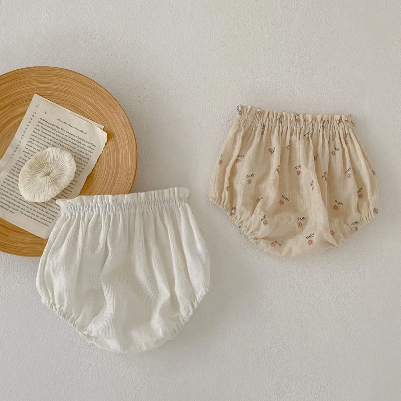 New summer baby clothing, 0-3 year old girls with floral wood ear edges wrapped in butt bread pants shorts