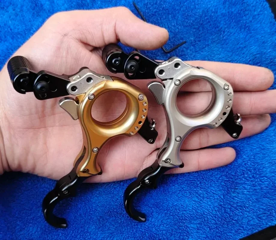 

Three four finger interchangeable grip brass plate metal dispenser
