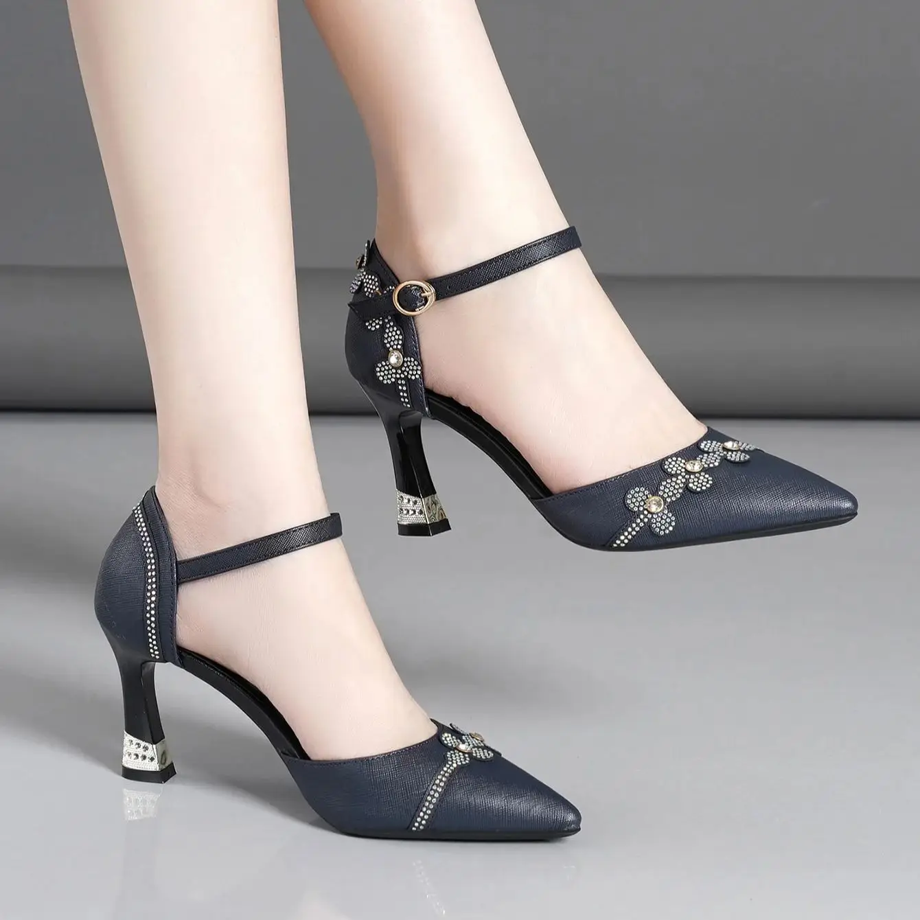 Pointy flower fashion high heels with a pair of hollow sandals