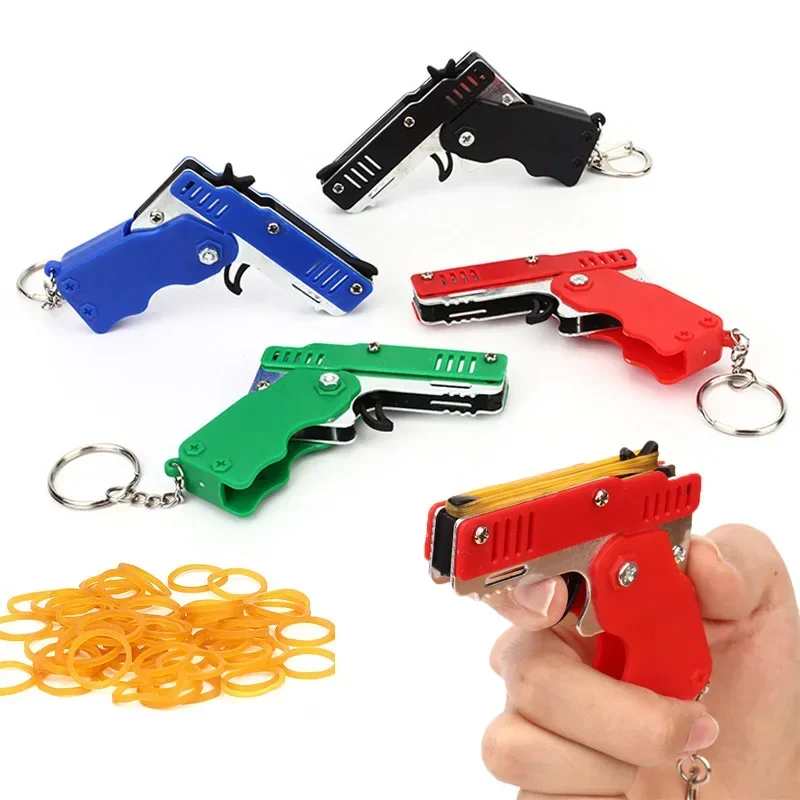 1PC Mini Keychain Gun Rubber Band Gun Toy Gun Shooting Pistol Alloy Kid Outdoor Activities Party Game Birthday Gift for Children