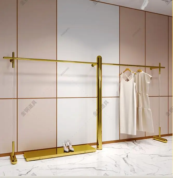 

Clothing store display shelf wall hanging floor stainless steel titanium gold hanging clothes shelf women's store display shelve