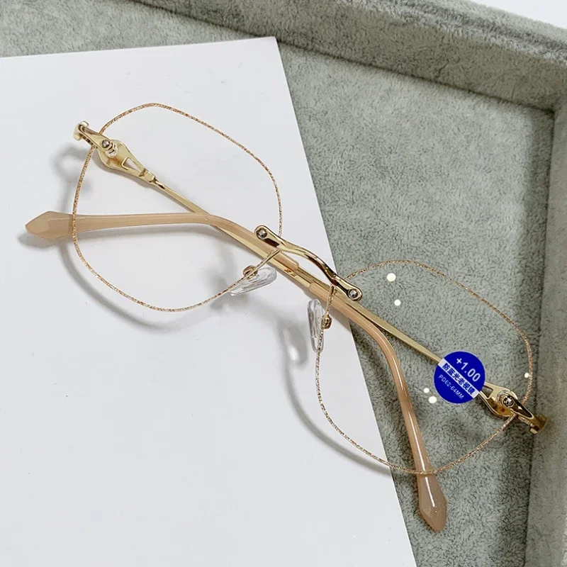Occhiali da lettura senza cornice tagliati in metallo occhiali da presbiopia squisiti ed eleganti Anti luce blu da donna + 1.0 a + 4.0
