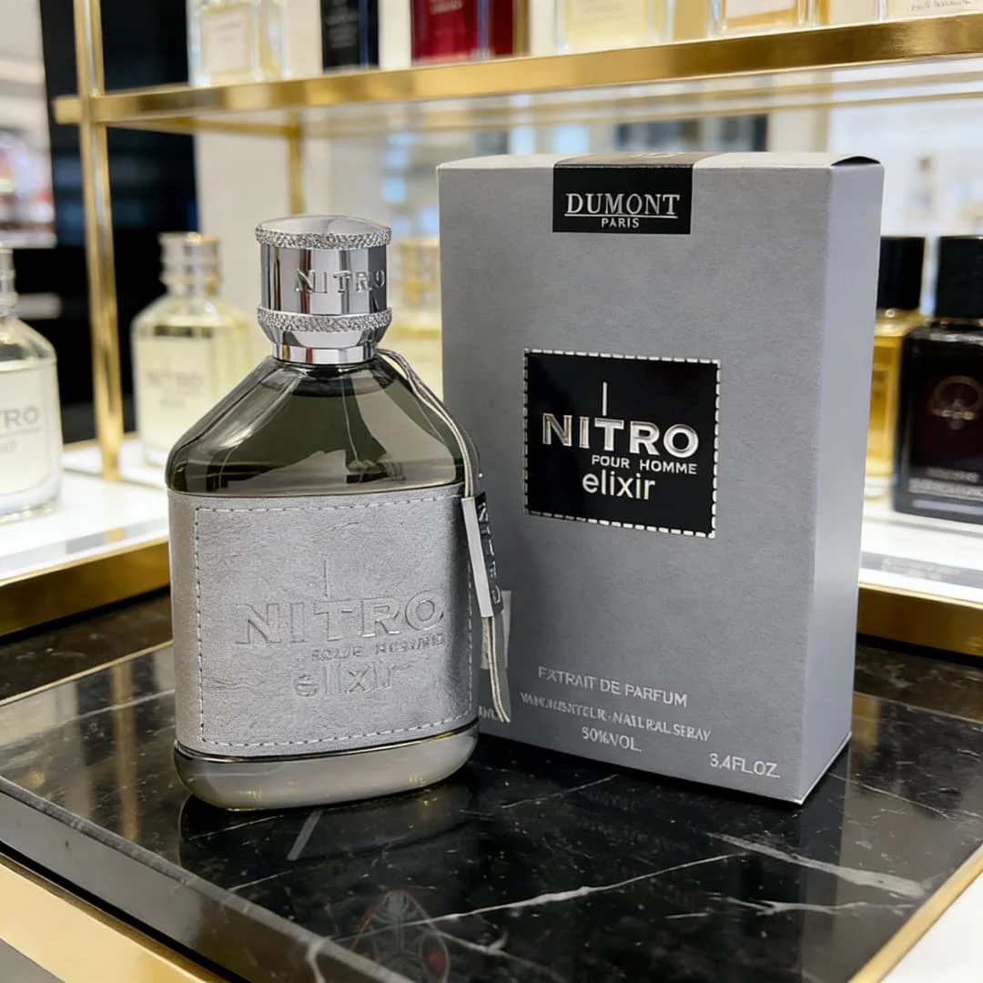 

Dumont Nitro Elixir Men's essence wrapped in silver leather, with strong wood and ebony tone, showing a calm and luxurious aura