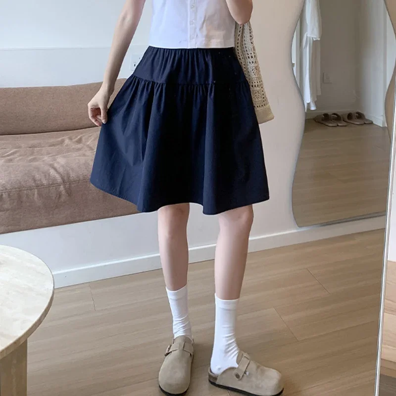 

College Style Loose A Line Skirts Women Summer Elastic High Waist Pleated Skirts Woman Japanese Solid Above-Knee Length Skirt