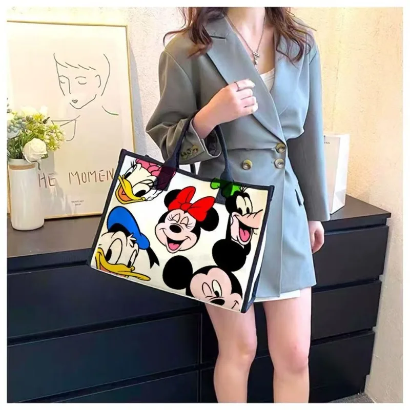 Disney New Minnie Fashion Cartoon Canvas o dużej pojemności damska torba na ramię dojazdy do pracy na co dzień wszechstronna torba typu Tote