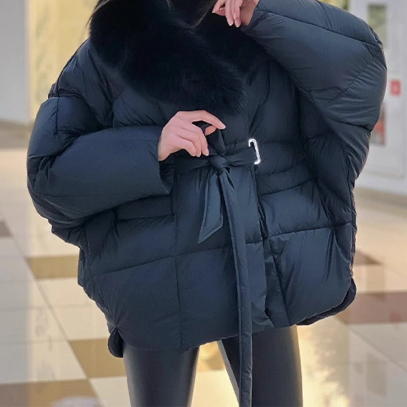 منتج شتاء جديد 2025 سترة قطنية فضفاضة ومتعددة الاستخدامات بلون سادة وياقة من الفرو قابلة للإزالة ورباط #1