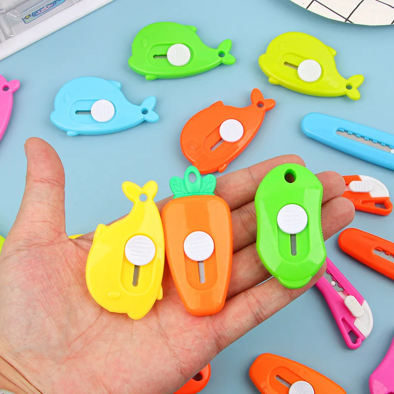 

One. Mini portable art knife trumpet mini cute shape express box knife sharp. Random color