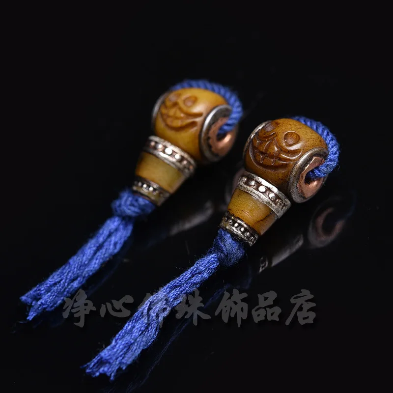 Camel bone three-way Buddha head carving with a smiling face A-Dai cultural accessory