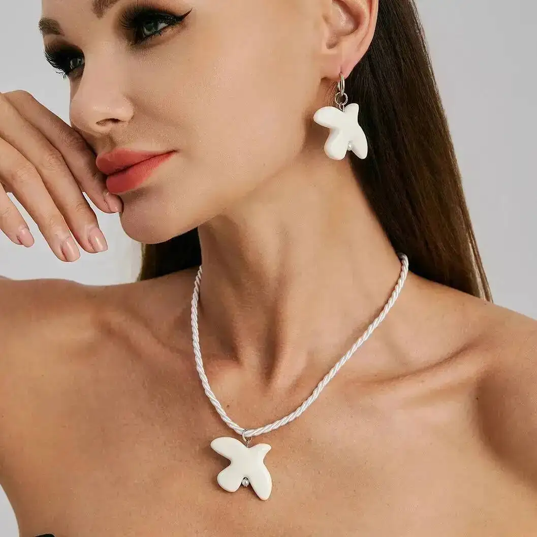 

KunJoe Minimalist Ceramic Peace Dove Pendant Necklace Drop Earrings Jewelry Set For Women Adjustable Nylon Rope Chain Necklace