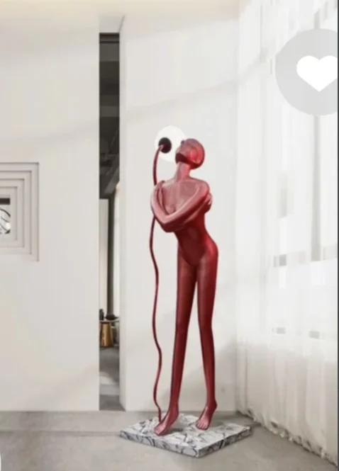 Humanoid ornaments two floor lamps