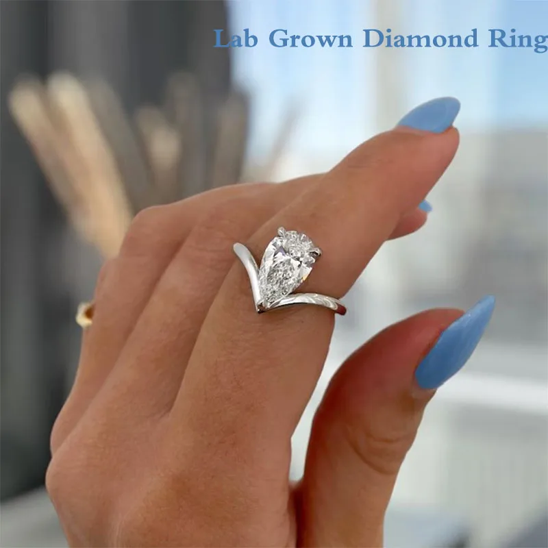 

Обручальное кольцо с бриллиантом грушевидной огранки EF/VS, выращенное в лаборатории, 2,00 карата, изогнутое кольцо Platinum 950.