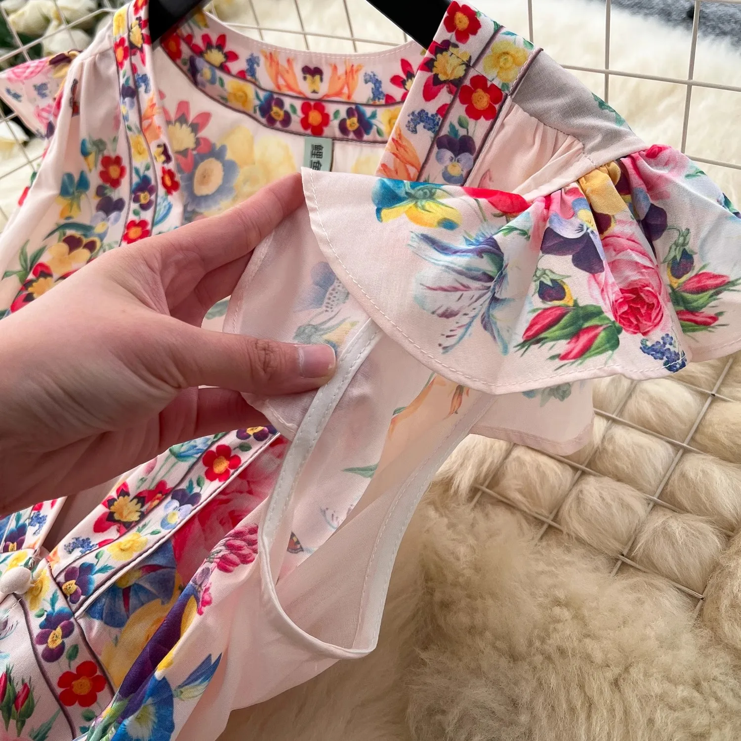 Mode vacances d'été magnifique fleur en mousseline de soie Robe longue nouveau Boho femmes volants profond Sexy col en V sans manches imprimé bouton Robe