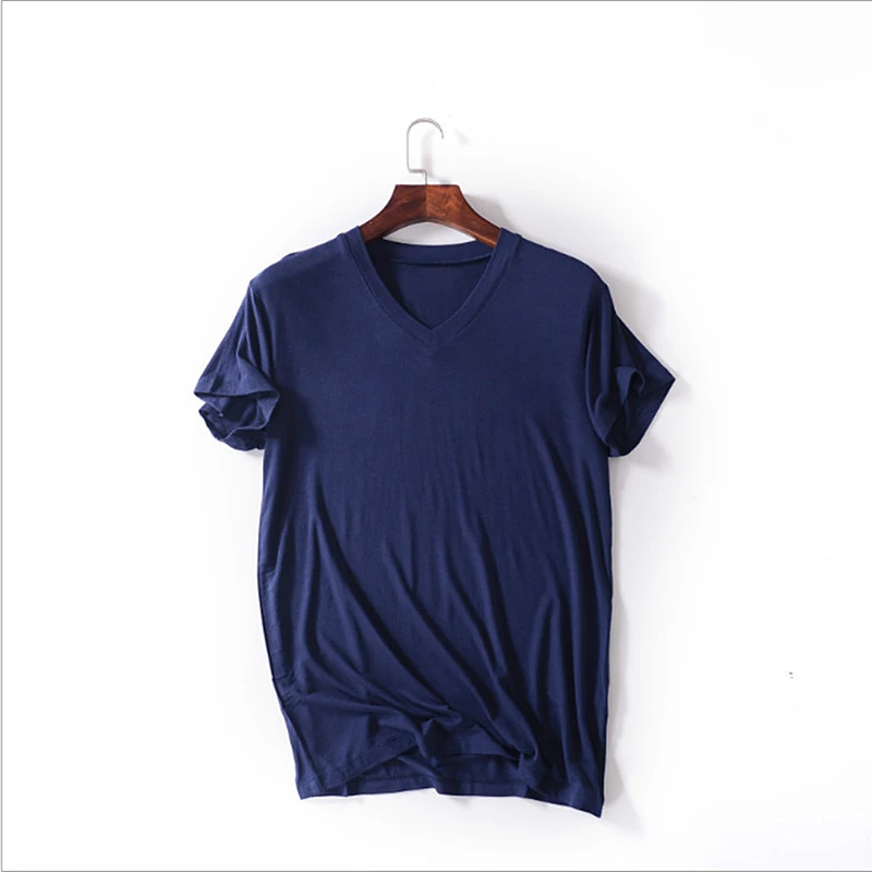 Camiseta de Modal para hombre, camisa holgada de manga corta con cuello en V, talla grande, Color sólido, 2024