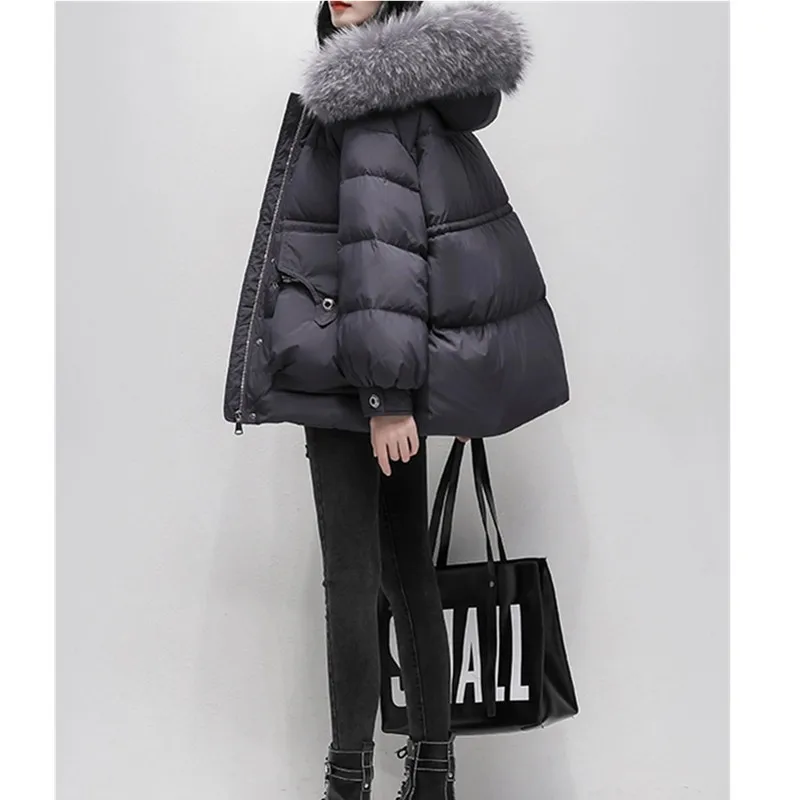 Weiße kurze Daunenjacke für Damen, Winter 2025, neue koreanische Version, lose dicke Dame, großer Pelzkragen, weiße Entendaunenmäntel