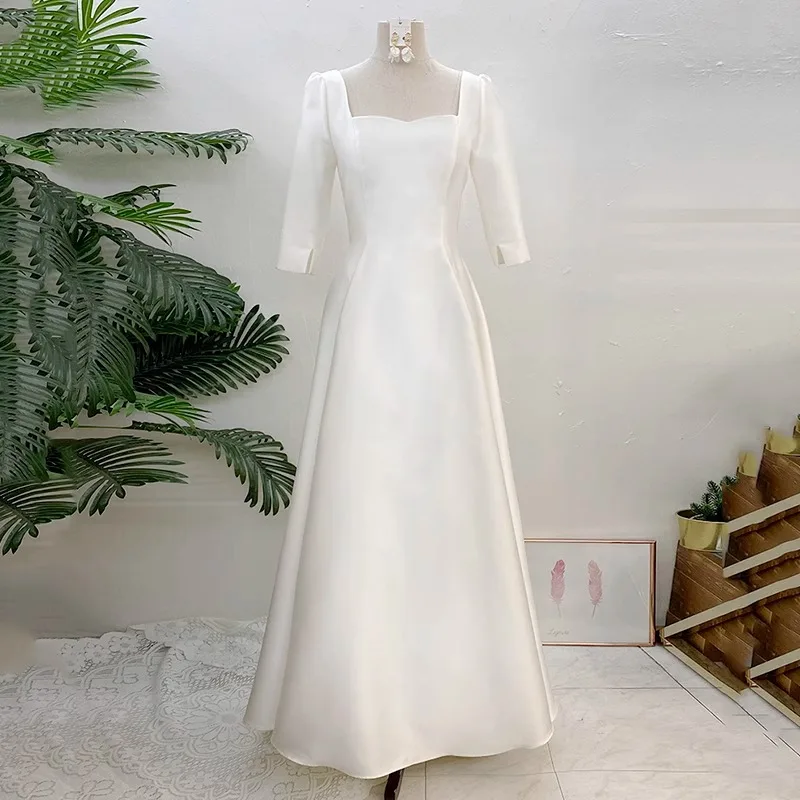 

Белое вечернее платье трапециевидной формы. Простые свадебные платья с коротким рукавом. Элегантное атласное свадебное платье длиной до пола.