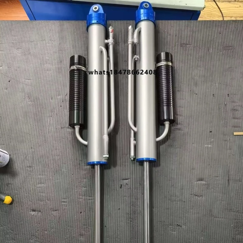 

travel range is 10 inches to 18 inches with three-bypass tank shock absorbers