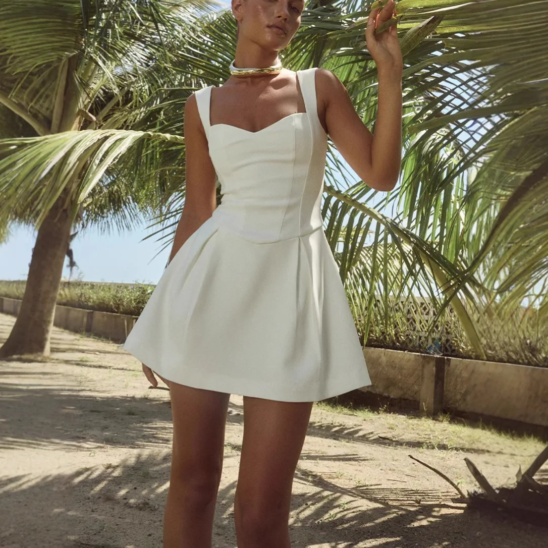 เซ็กซี่กระโปรงแขนกุดผู้หญิงสีทึบฤดูร้อน V คอชุดมินิสําหรับผู้หญิง 2025