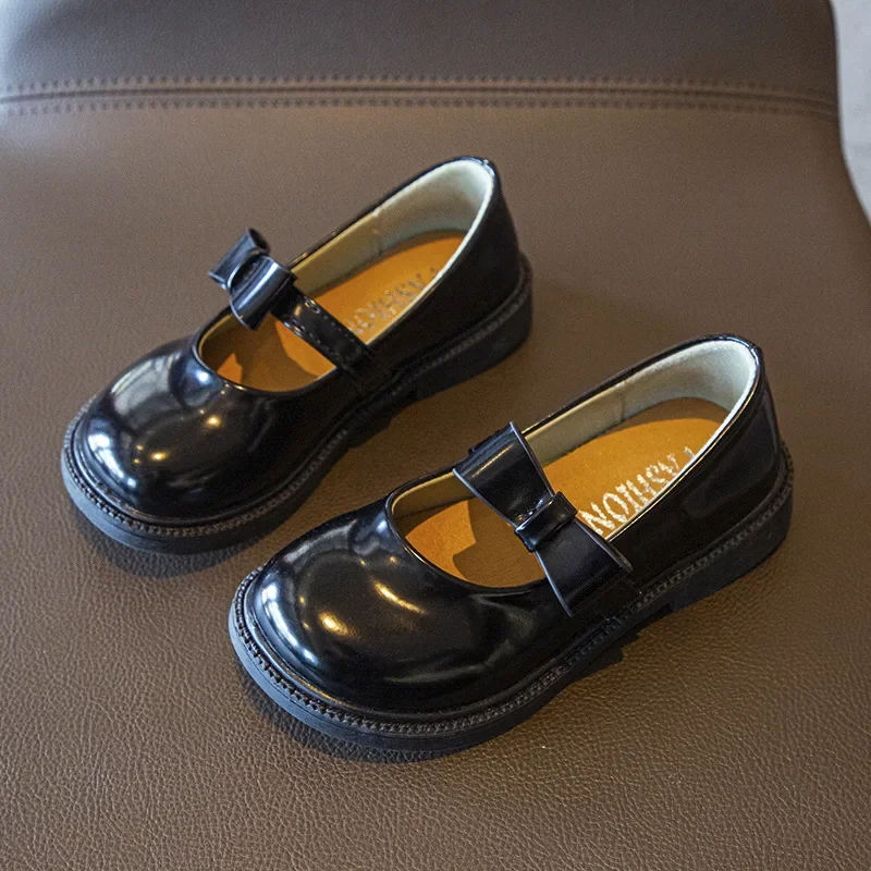 Zapatos de cuero para niños y niñas, calzado escolar suave con lazo versátil, mocasines informales poco profundos, color negro, novedad de 2023