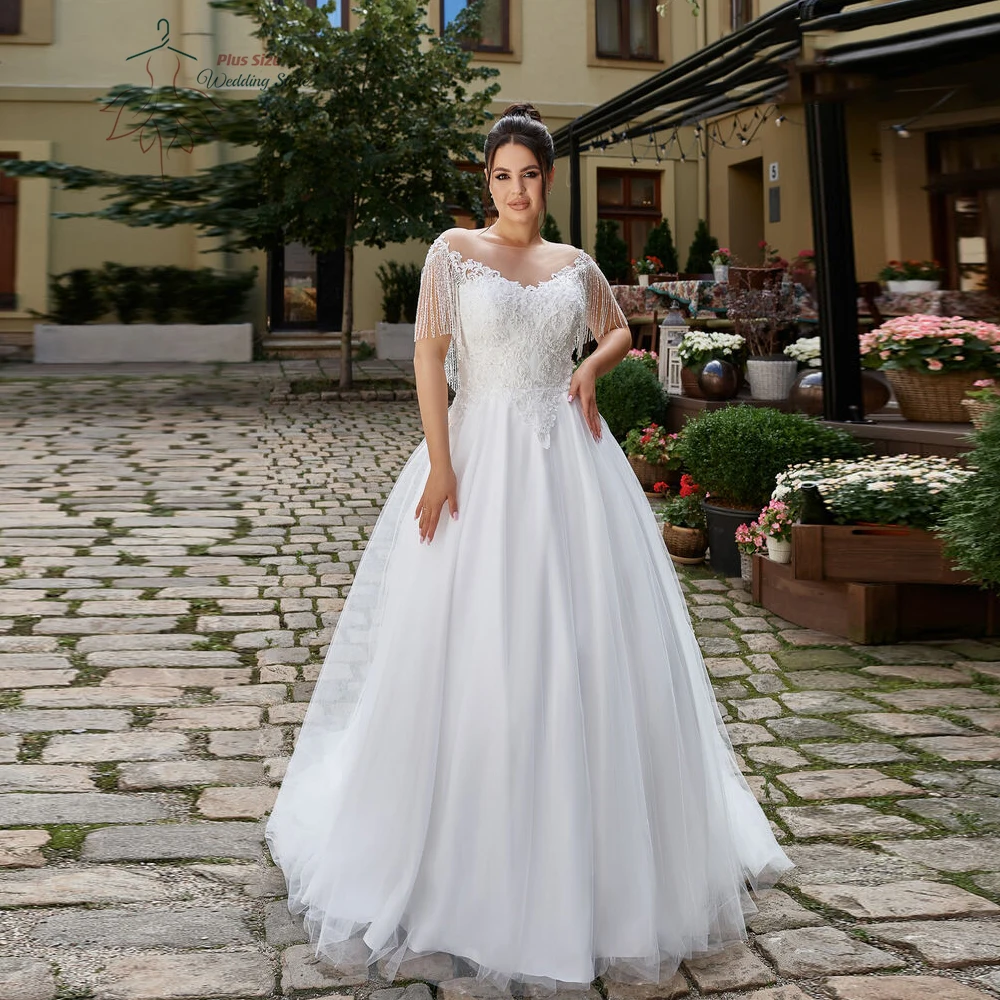 

Elegant Wedding Dresses Plus Size O Neck Short Sleeves Bride Gowns Tassel Appliques Floor Length A-Line Tulle Vestidos De Novia