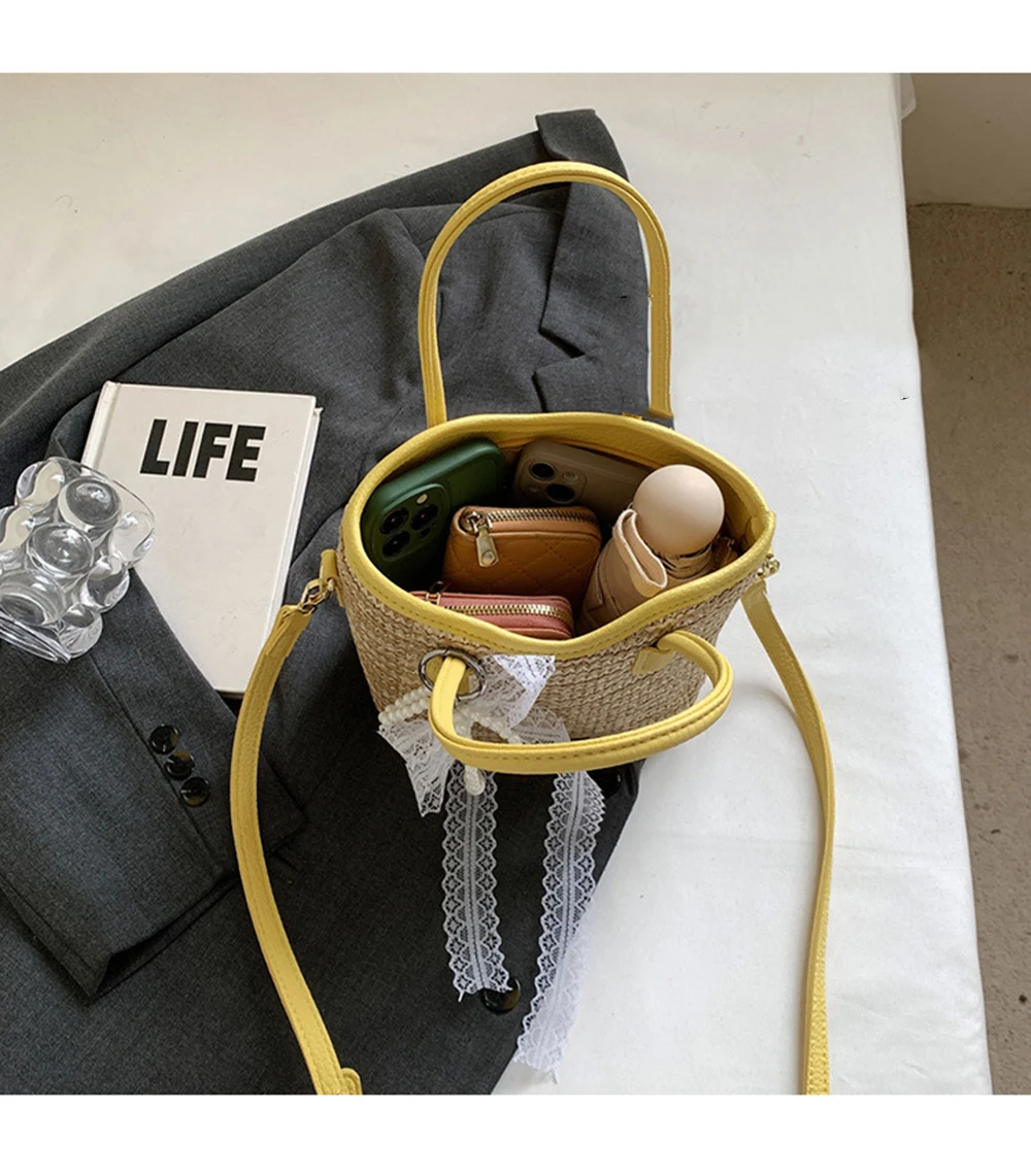 المرأة دلو حقيبة القش المنسوجة Crossbody حقيبة شاطئية عادية تخفيف عطلة نمط كتلة اللون تصميم يده حمل حقائب الإناث