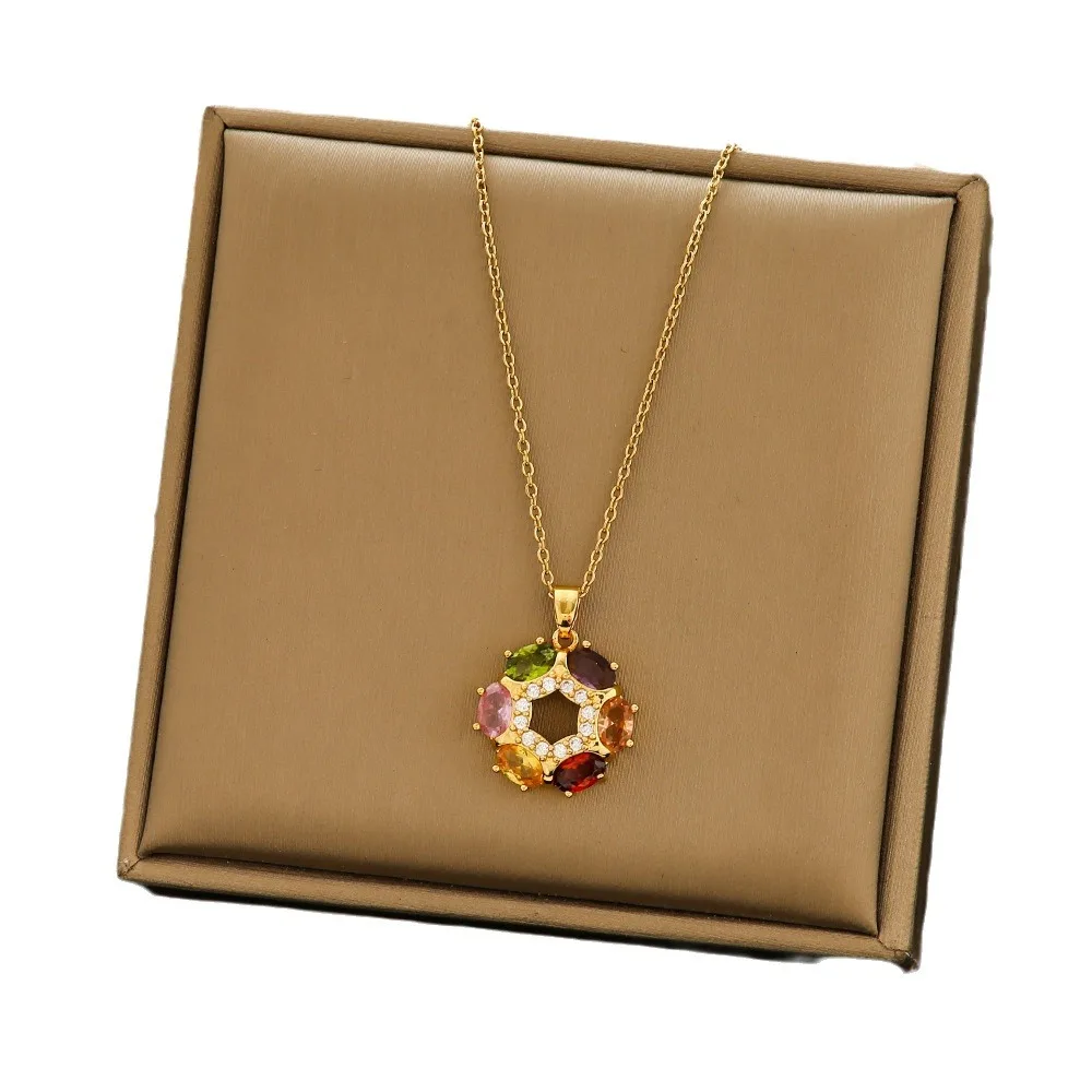 A circle of colorful diamond-encrusted necklace, women's earrings, ring three-piece set, circle titanium steel chain set